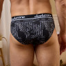 Черные трусы-брифы с замысловатым принтом